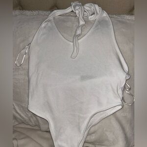 Medium white  halter neck, bodysuit. Worn 1x. From fashion nova.